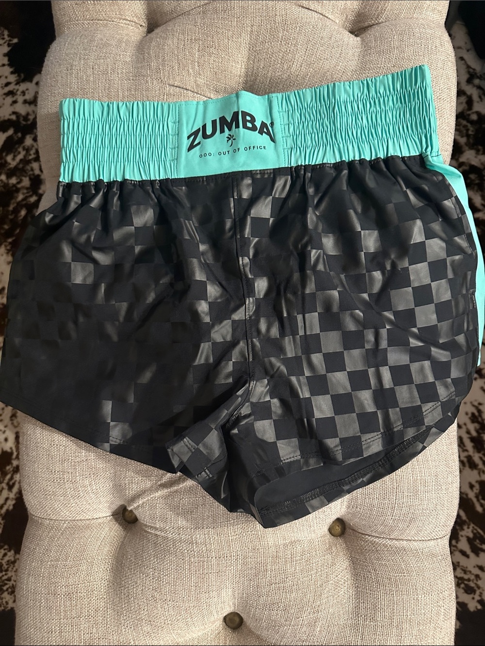 Zumba Fitness Women's Black Checkerboard Shorts with Teal Waistband